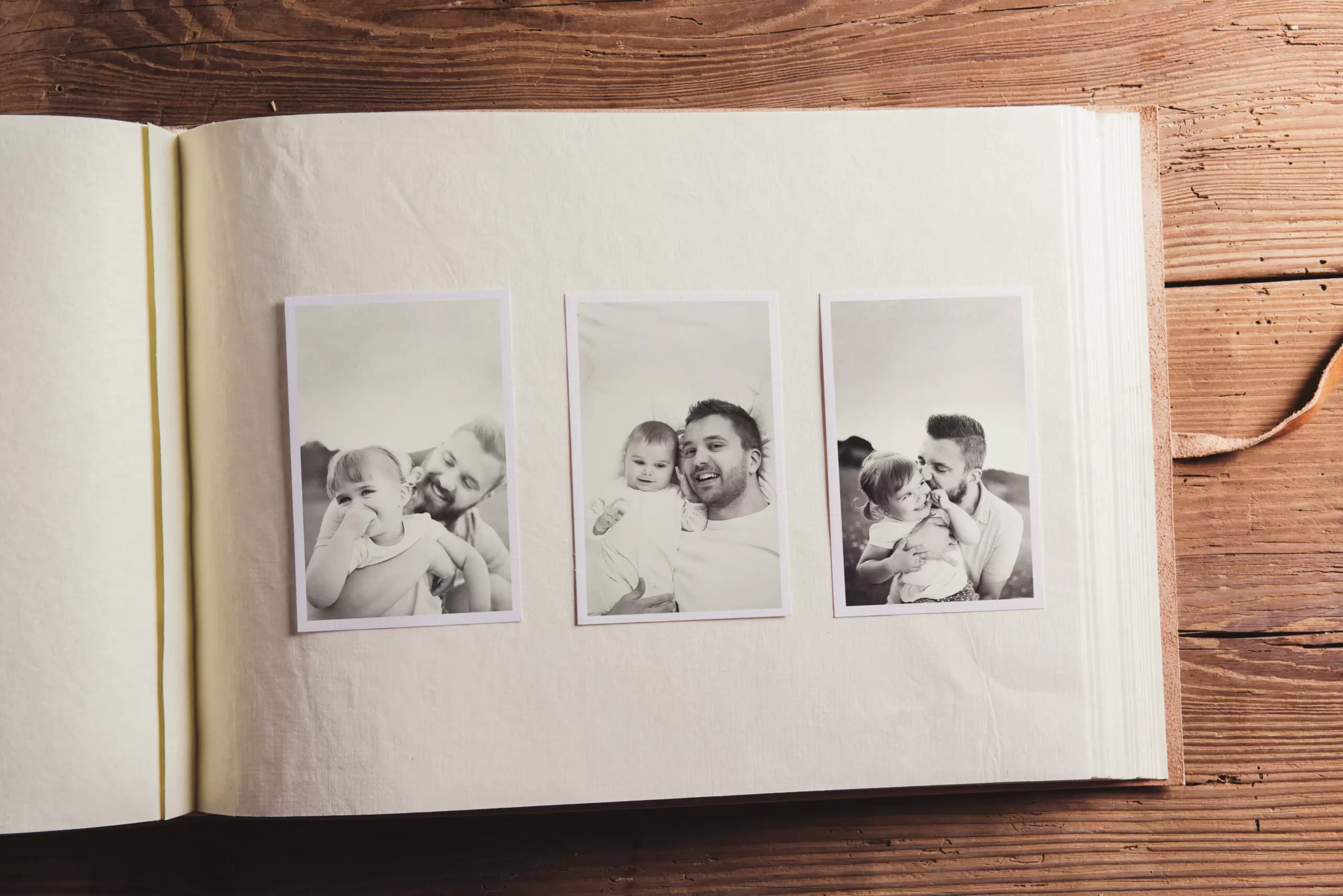 graphicstock-photo-album-with-black-and-white-family-pictures-studio-shot-on-wooden-background_SAliVMhp-W-scaled graphicstock-photo-album-with-black-and-white-family-pictures-studio-shot-on-wooden-background_SAliVMhp-W-scaled